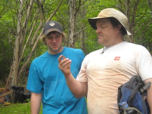 Tyler Thompson '11 and Monticello archaeologist Don Gaylord examine an artifact