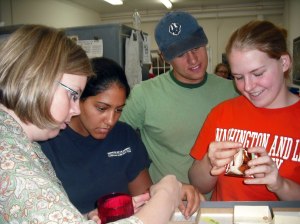 Karen Smith, Kathleen Ninan '11, Franics Cullo '12, and Makenzie Hatfield '12 in the Monticello Archaeology Lab
